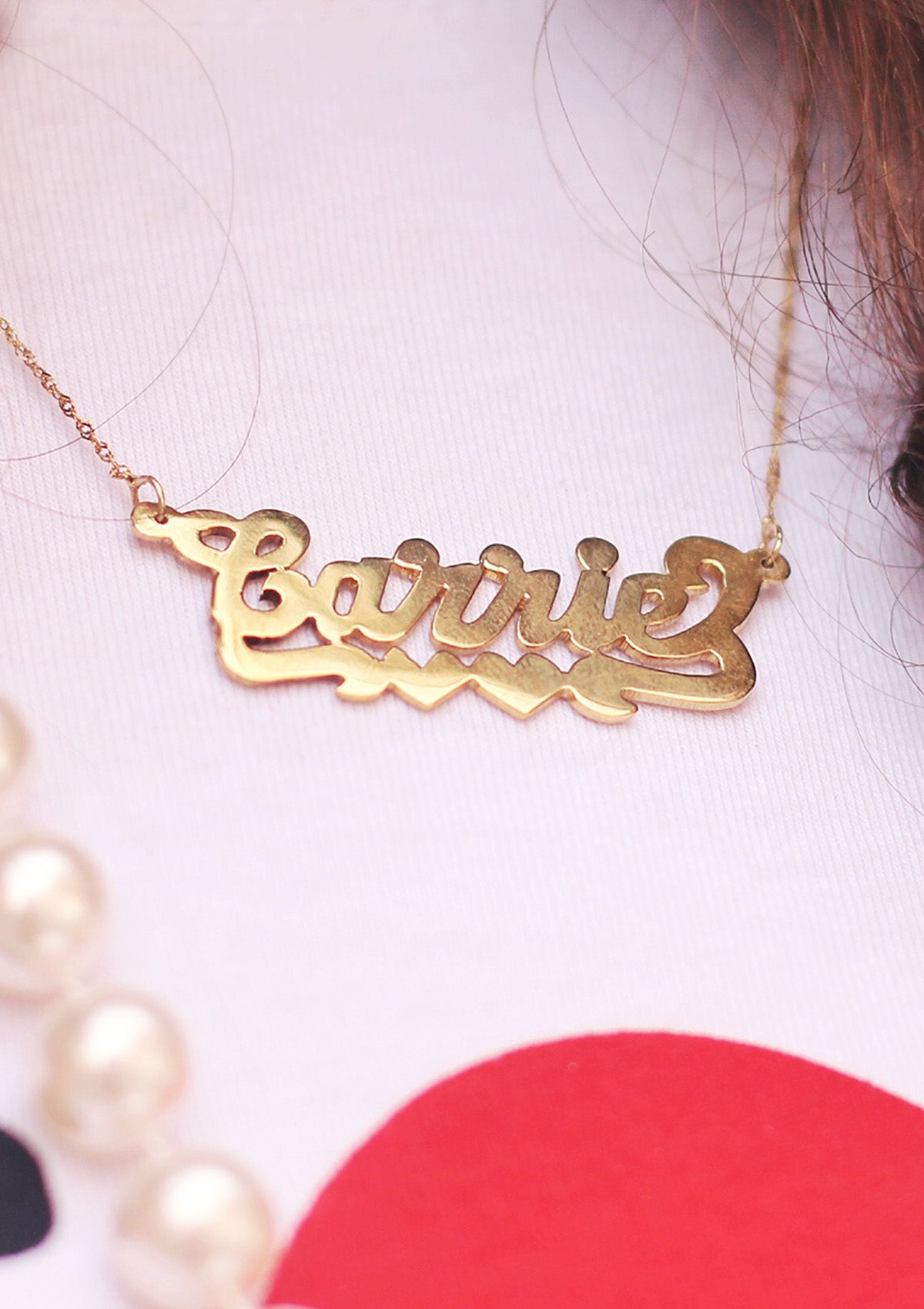 WWD features Caroline Vazzana in Patricia Field ARTFashion with Carrie 2.0 Nameplate Necklace