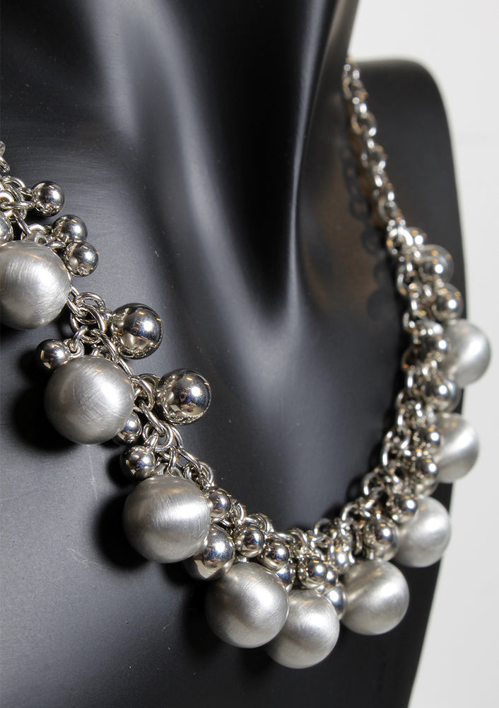 silver pearl like necklace